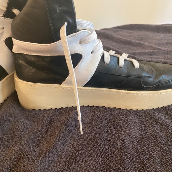 A pair of used sneakers. - Picture 5 of 7